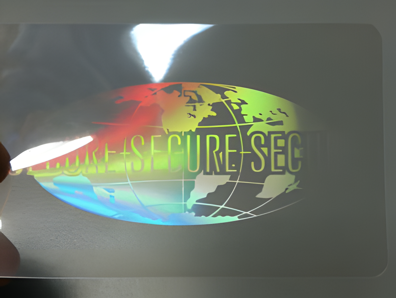 Hand Applied Pressure Sensitive Overlay, 3.5 mil, Secure World Globe Hologram (500/pack)
